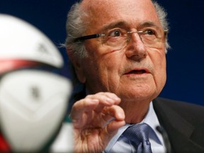 FIFA President Sepp Blatter gestures as he addresses a news conference after a meeting of the FIFA executive committee in Zurich on Friday, March 20, 2015. (Arnd Wiegmann/Reuters)