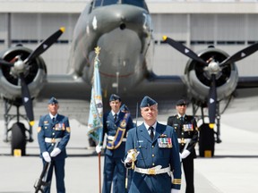 Col. Colin Keiver, former commanding officer of 436 Transport Squadron, leads his personnel from the "Canucks Unlimited" during a parade as the squadron receives its news colours and standards —  the shrine of the squadron's tradition — from Lt. Gov. of Ontario David Onley, at 8 Wing/CFB Trenton, ON on Thursday, May 17, 2012. -  FILE/JEROME LESSARD/THE INTELLIGENCER/QMI AGENCY