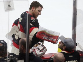 Ottawa Senators goalie Andrew Hammond takes a water break during a TV time out late in the third period against the Boston Bruins at the Canadian Tire Centre in Ottawa Thursday, March 19,  2015. The Ottawa Senators defeated the Boston ruins 6-4.  (Tony Caldwell/Ottawa Sun/QMI Agency)