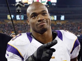Running back Adrian Peterson's agent reportedly declined a request by the Vikings GM to meet next week. (Tom Lynn/Reuters/Files)