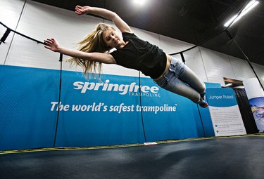 Brynn Trofimuk, 17, tries out a trampoline during the Edmonton Home and Garden Show at the Edmonton Expo Centre in Edmonton, Alta., on Friday, March 20, 2015. Codie McLachlan/Edmonton Sun/QMI Agency