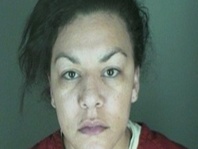 Dynel Catrece Lane, 34, is shown in this booking photo provided by the Longmont Police Department near Denver, Colorado March 19, 2015. Lane has been charged in connection with the stabbing of a pregnant Colorado woman who had her baby cut from her womb after answering a Craigslist ad for baby clothes, according to police reports. (REUTERS/Longmont Police Dept/Handout via Reuters)