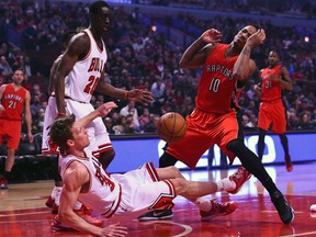 Toronto Raptors guard DeMar DeRozan (10) fouls Chicago Bulls forward Mike Dunleavy (34) during the first half on March 20. (USA Today Sports)