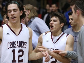 The St. Paul's Crusaders celebrate their victory. (KEVIN KING/Winnipeg Sun)