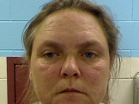 Joyce Hardin Garrard is seen in a booking photo released by the Etowah County Sheriff's Office in Etowah County, Alabama on February 23, 2012. (REUTERS/Etowah County Sheriff's Office/Handout)