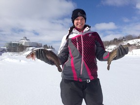 Special to The Star   
Living With Lakes Centre fish technician Bender shows off a pair of Ramsey Lake ling.