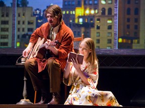 Michelle Phillips, played by Katie Ryerson, sits next to John Phillips, played by Isaac Bell, as they write the lyrics to the hit song "California Dreamin'" in a scene from Dream A Little Dream: The Nearly True Story of The Mamas and The Papas at The Grand Theatre in London. CRAIG GLOVER/The London Free Press/QMI Agency