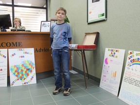 Morgan Mason stalked out a position at Seaforth's TD Bank branch on March 20 to raise money for autism awareness. (Marco Vigliotti/Huron Expositor)