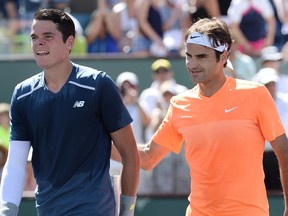 Roger Federer (SUI) shakes hands with Milos Raonic (CAN) after their semi final match at the BNP Paribas Open at the Indian Wells Tennis Garden. Federer won 7-5, 6-4. (Jayne Kamin-Oncea-USA TODAY Sports)