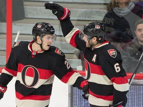 Ottawa Senators left wing Matt Puempel (26) and right wing Bobby Ryan celebrate a goal scored by Ryan in the third period against the Boston Bruins at the Canadian Tire Centre. (Marc DesRosiers-USA TODAY Sports)