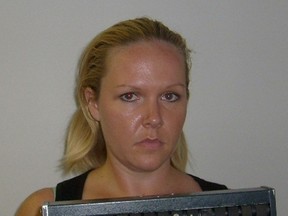 Jessica Lacey McCarty is pictured in this booking photo from 2009, provided by Palm Bay Police. Florida police are investigating what they believe to be an attempted murder-suicide by McCarty, a mother who killed her six-year-old daughter and critically wounded her two sons, Palm Beach police spokeswoman Yvonne Martinez said on March 20, 2015. (REUTERS/Palm Bay Police/Handout)