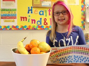 On March 12, Gabriella Miller, a Grade 3 student at Parkland Village, proudly presented her Produce Passport. This Produce Passport is part of the Rainbow Connection program at the school that encourages kids to eat colourful fruits and vegetables.