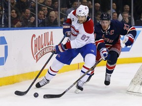 Montreal Canadiens left wing Max Pacioretty (67) controls the puck defended by New York Rangers defenseman Ryan McDonagh (27) during the first period at Madison Square Garden. The Canadiens defeated the Rangers 1-0.  (Adam Hunger-USA TODAY Sports)