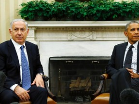 U.S. President Barack Obama, right, meets with Israel's Prime Minister Benjamin Netanyahu at the White House in Washington October 1,  2014. (REUTERS/Kevin Lamarque)
