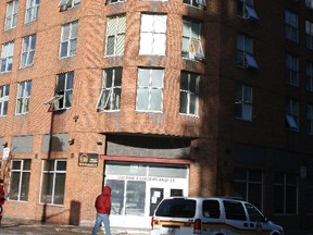 The worst damage appeared to be on the second-floor of this Lowertown building at the corner of Cumberland and George streets.
Firefighters were called just before 6 a.m. Sunday, March 22, 2015 after getting a call from an alarm company. They arrived to find smoke and managed to get the fire out within 10 minutes.
Most of the building's windows were opened to ventilate and streets in the area were closed until after 8 a.m. The sidewalks on Cumberland St. had to be salted due to the ice created by the firefighters who battled the small fire in -15C temps.
Only one person was hurt and was treated by paramedics for a minor injury. The cause of the fire remains under investigation.
DOUG HEMPSTEAD/Ottawa Sun/QMI AGENCY