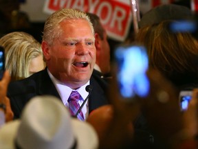 Doug Ford speaks after losing his election battle to become mayor to John Tory on Oct. 27, 2014. (DAVE ABEL, Toronto Sun)