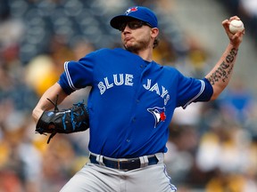 Toronto Blue Jays relief pitcher Brett Cecil (27) pitches in the ninth inning against the Pittsburgh Pirates at PNC Park. (Rick Osentoski-USA TODAY Sports)