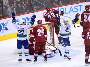 Vancouver Canucks defenseman Alexander Edler (not pictured) scores a goal against the Arizona Coyotes during the third period at Gila River Arena. The Canucks won 3-1. (Joe Camporeale-USA TODAY Sports/Reuters)