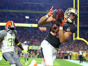 Team Irvin tight end Jimmy Graham of the New Orleans Saints catches a touchdown pass in front of Team Carter safety Donte Whitner of the Cleveland Browns in the 2015 Pro Bowl at University of Phoenix Stadium on Jan. 25, 2015. (Rebilas/USA TODAY Sports)