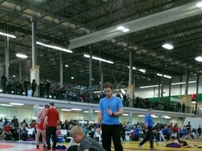 Local wrestler Colin Buchan (on top) came out winning a silver medal at the Alberta Opens held recently.