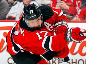 Ilya Kovalchuk #17 of the New Jersey Devils follows through on a shot in the second period against the Florida Panthers at the Prudential Center on March 23, 2013. (Jim McIsaac/Getty Images/AFP)