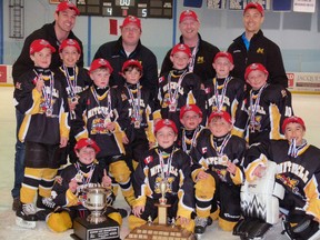 The Mitchell Novices went unbeaten in the playoffs to win the WOAA Twolan Division championship in Kincardine last Saturday, March 21. Team members are (back row, left to right): Coaches Karl Terpstra, Cain Templeman, Greg Van Bakel and Greg Houben. Middle row (left): Rhett Terpstra, Jared Vosper, Daniel Ogilvie, Carson Harmer, Zach Houben, Cole Baier, Brock Boville. Front row (left): Jarrett Van Bakel, Caleb Templeman, Vincent Voros, Josh French and Hayden Beuermann.  SUBMITTED PHOTO