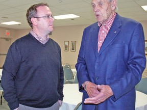 Perth-Wellington Liberal candidate Stephen McCotter (left) listens to former Liberal MPP Hugh Edighoffer during a meeting March 7 in Mitchell. McCotter won the Liberal nomination last November and was in Mitchell in early March to meet with local Liberals, businesses and potential constituents.  KRISTINE JEAN/MITCHELL ADVOCATE