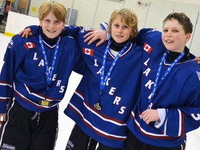 Mitchell Minor Hockey products Tanner Dietz (left), Logan Harmer and Aiden McMann were part of the Huron-Perth Minor Pee Wee AAA Lakers to win the Alliance playoff championship. SUBMITTED