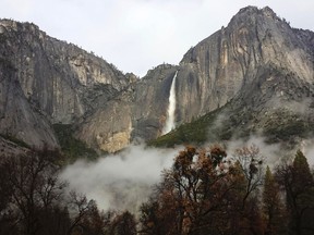 A general view of the Yosemite Falls flowing in Yosemite National Park in this December 3, 2014 picture provided by the National Park Service. Two days of heavy rains have re-invigorated the landmark falls, as a major Pacific storm brought more rain on Wednesday.  REUTERS/National Park Service/Handout via Reuters