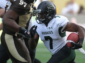 Dexter Janke, in white, spent a year with the University of Saskatchewan Huskies before joining the Okanagan Sun program. (QMI Agency)