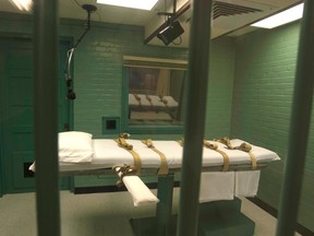 The death chamber is seen through the steel bars from the viewing room at the federal penitentiary in Huntsville, Texas in this September 29, 2010 file photo. (REUTERS/Jenevieve Robbins/Texas Dept of Criminal Justice/Handout via Reuters)