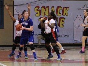 Action from the provincial high school girls basketball championship final between Sisler Spartans and Oak Park Raiders, on Monday, March 23, 2015, at the Duckworth Centre. The Spartans won 83-51.
RUSTY BARTON, For the Winnipeg Sun