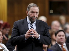 New Democratic Party leader Thomas Mulcair responds to the government's plan to expand its military mission against Islamic State in the House of Commons on Parliament Hill in Ottawa March 24, 2015. Canada will expand its military mission against Islamic State by launching air strikes against its positions in Syria as well as Iraq, Canada's Prime Minister Stephen Harper said on Tuesday. REUTERS/Chris Wattie