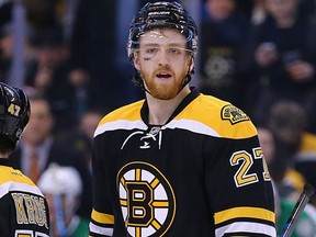 Dougie Hamilton of the Boston Bruins reacts after the Bruins allowed their fifth goal against the Dallas Stars during the third period at TD Garden on February 10, 2015. (Maddie Meyer/Getty Images/AFP)