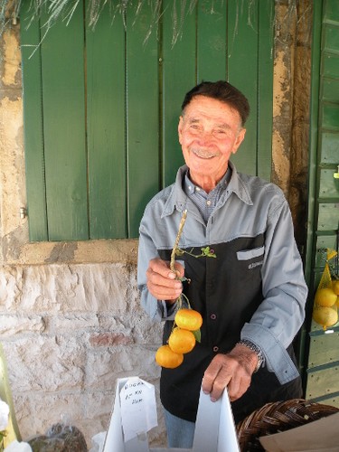 A friendly farmer sells fresh oranges at one of the colourful roadside stands along the Adriatic Hwy. JANIE ROBINSON PHOTO