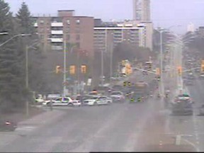 Ottawa cop was treated for minor injuries after his cruiser was involved in a three-car collision Tuesday afternoon in Ottawa. CITY TRAFFIC CAM IMAGE/