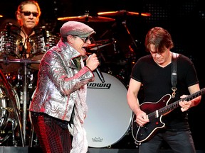 David Lee Roth (left) and Eddie Van Halen perform at Rexall Place in Edmonton, Friday May 11, 2012. (David Bloom/QMI Agency)