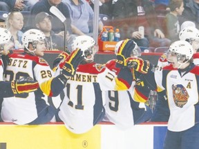 Erie Otters forward Dylan Strome celebrates a goal with teammates during Erie?s 8-7 win over the Niagara IceDogs in St. Catharines on Sunday. Strome scored four goals and two assists to clinch the Ontario Hockey League scoring title. (Bob Tymczyszyn, QMI Agency)