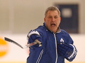 Maple Leafs interim head coach Peter Horachek barks orders during a practice this season. (Michael Peake/Toronto Sun)