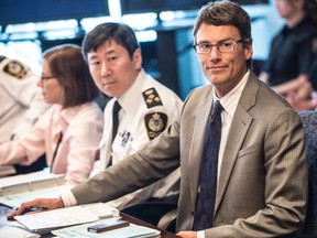(Left) Vancouver Chief Constable Jim Chu and Vancouver Mayor Gregor Robertson at police board meeting.
(File photo)