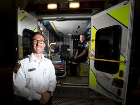 Middlesex-London paramedics such as Dustin Carter, left, and Andrea Flaherty will be on the front lines of three new programs aimed at connecting those most likely to call 911 with community care. (DEREK RUTTAN, The London Free Press)