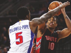 Raptors guard DeMar DeRozan looks to shoot the ball as Pistons guard Kentavious Caldwell-Pope defends during Tuesday night’s game in Detroit. (USA TODAY SPORTS)