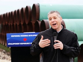Russ Girling, CEO of TransCanada Corp. speaks at the pipe yard for the Houston Lateral Project, a component of the Keystone pipeline system in Houston, Texas March 5, 2014.  REUTERS/Rick Wilking