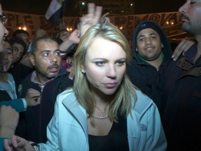 CBS correspondent Lara Logan is pictured in Cairo's Tahrir Square moments before she was assaulted in this Feb. 11, 2011 handout file photo. (REUTERS/CBS News/Handout)