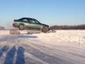 This viral YouTube video, showing a vehicle jumping an ice ramp in Gatineau, has netted a $1,293 fine for the driver. (YOUTUBE framegrab)