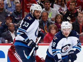 Bryan Little and Dustin Byfuglien's return to health can't come soon enough for the Winnipeg Jets. (Christian Petersen/Getty Images/AFP file photo)
