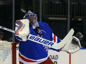 New York Rangers goalie Henrik Lundqvist makes a save. (Adam Hunger/USA TODAY Sports)