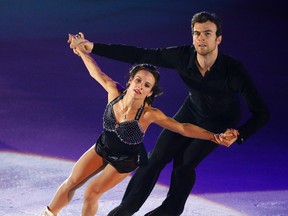 Figure skaters Eric Radford and Meagan Duhamel perform during Rock the Ice V at the Memorial Centre on Jan. 3, 2015. (Clifford Skarstedt/Peterborough Examiner/QMI Agency)