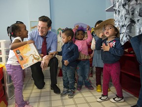MP Pierre Poilievre with children from the Sandy Hill Child Care centre. Poilievre announced changes to the child tax credit Wednesday.​ DANI-ELLE DUBE/OTTAWA SUN