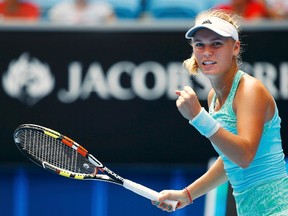 Caroline Wozniacki celebrates defeating Taylor Townsend during first round Australian Open action in Melbourne on Jan. 20, 2015. (Issei Kato/Reuters/Files)